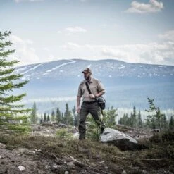 Helikon Woodsman Trousers Taiga Green / Black 16 Helikon Woodsman Trousers Taiga Green / Black -Military1st Shop helikon woodsman trousers lifestyle 002 6